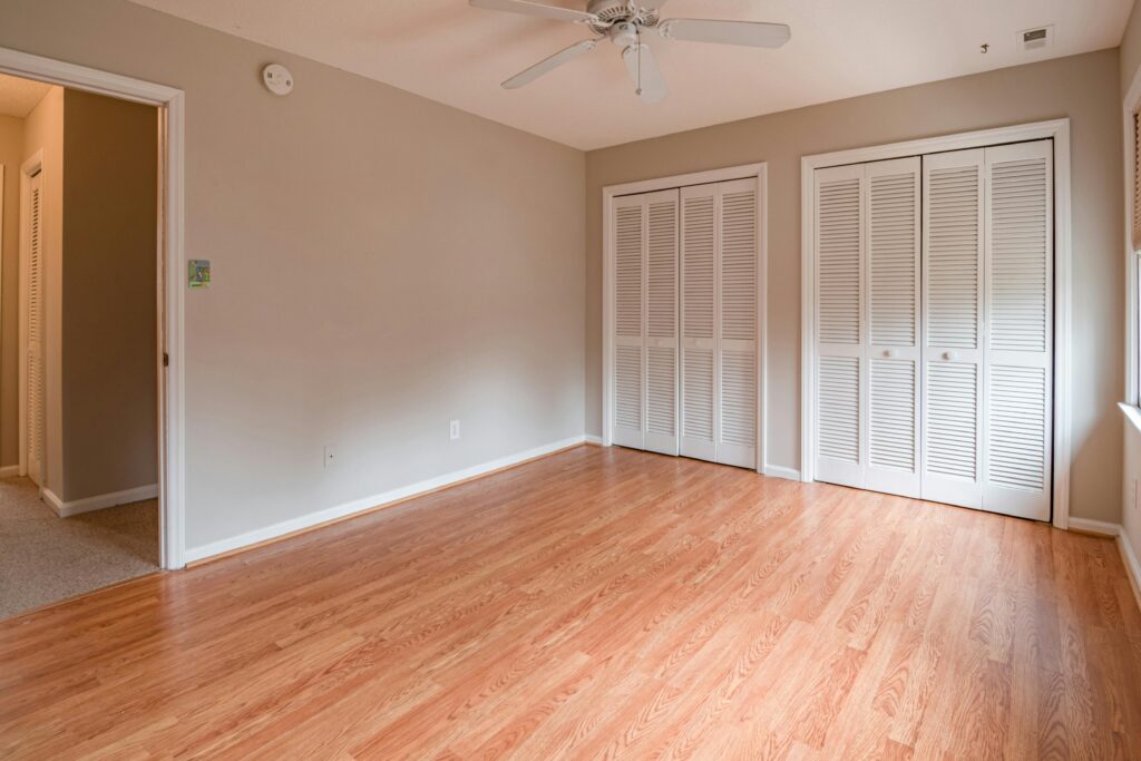 House cleaning professional wiping down surfaces