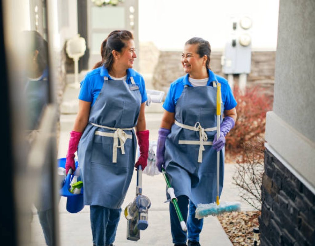 Maid using eco-friendly supplies cleaning Round Rock, TX residential property