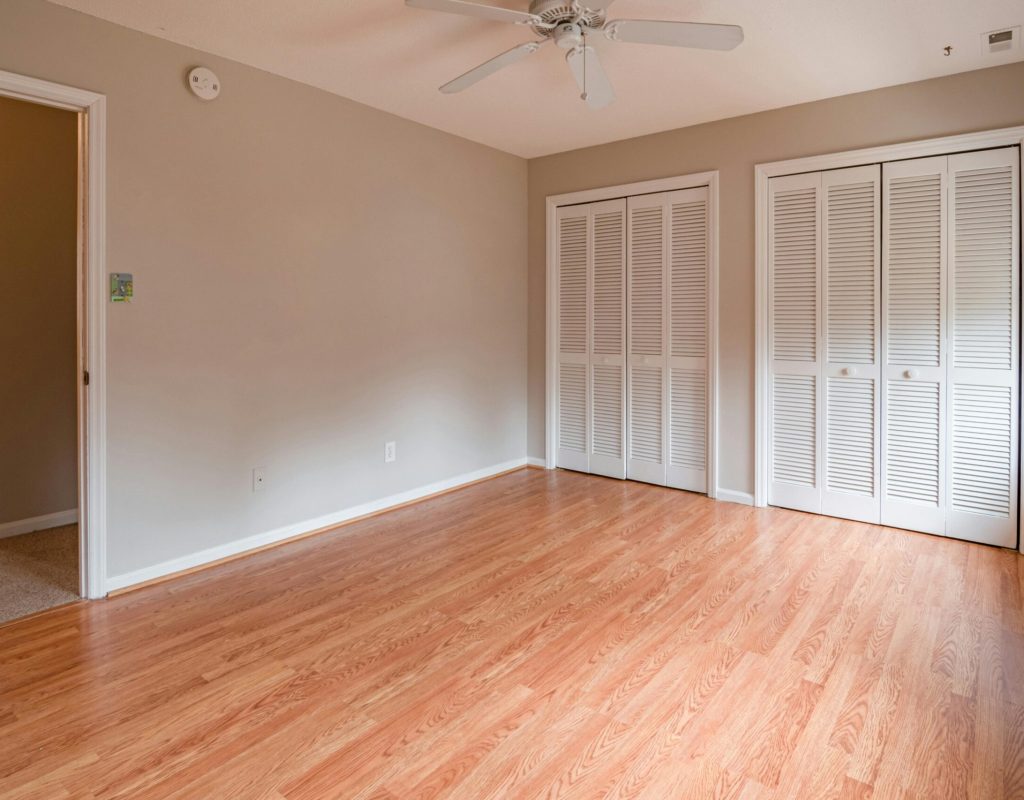 House cleaning professional wiping down surfaces