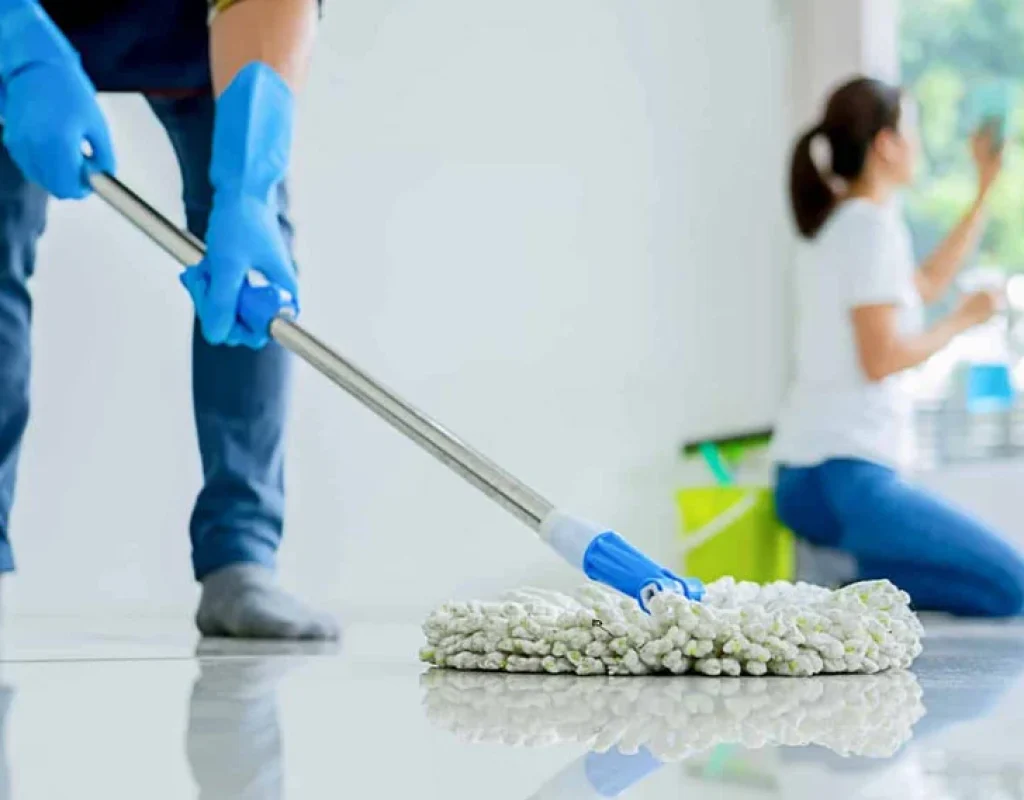 Cleaner performing weekly recurring tasks ensuring consistently fresh and tidy spaces.